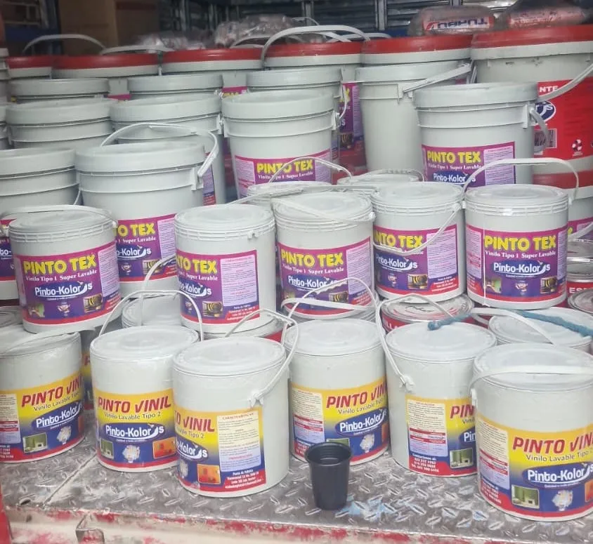 Proceso de producción y sedes de Pinto Kolors — camion cargado cubetas vinilo